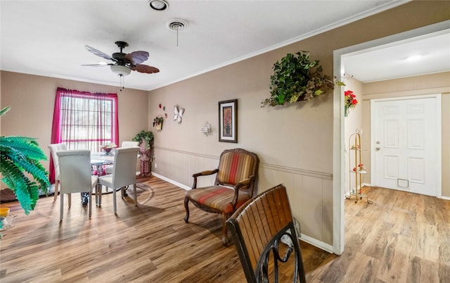 7223 Fm 2494, Athens, TX 75751 - sitting room with wood finished floors, a ceiling fan, crown molding, and baseboards