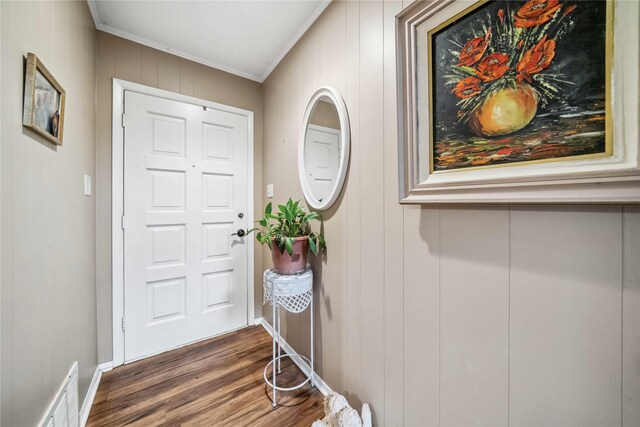 7223 Fm 2494, Athens, TX 75751 - foyer featuring crown molding, dark wood finished floors, and baseboards