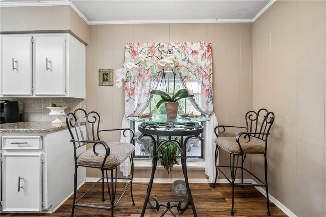 7223 Fm 2494, Athens, TX 75751 - dining area with dark wood finished floors, ornamental molding, and baseboards