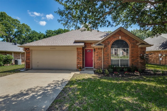 view of front facade featuring an attached garage, brick siding, driveway, a front yard, and a shingled roof