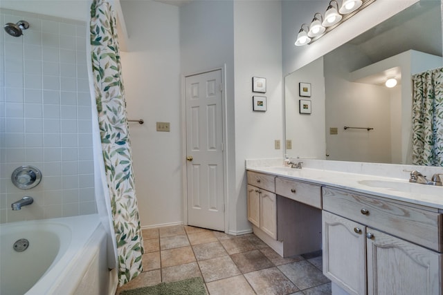 full bathroom featuring shower / bath combo with shower curtain, baseboards, and double vanity