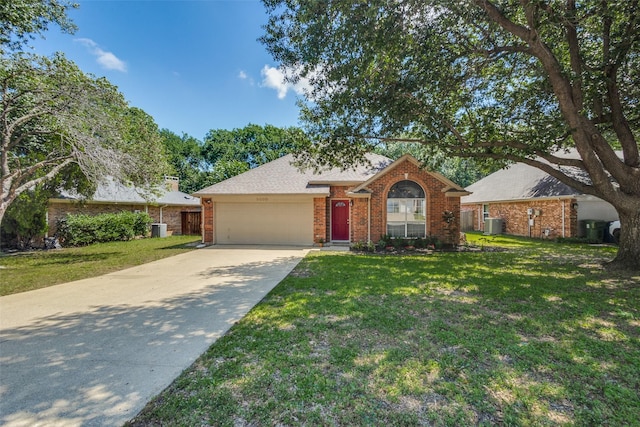 ranch-style house featuring an attached garage, brick siding, driveway, and a front yard