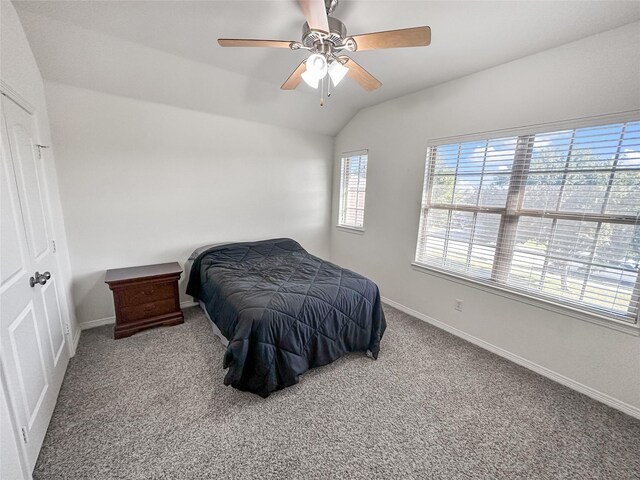 4317 Bay Meadow Dr, Denton, TX 76210 - carpeted bedroom featuring baseboards, ceiling fan, and lofted ceiling