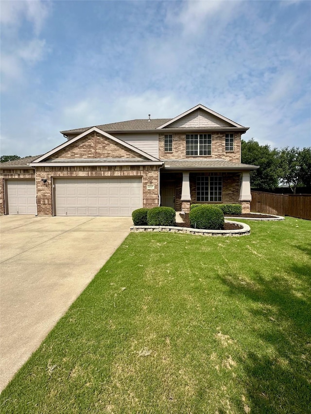 4317 Bay Meadow Dr, Denton, TX 76210 - view of front facade with a garage, concrete driveway, and brick siding