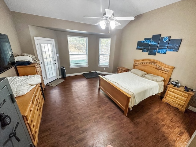 4317 Bay Meadow Dr, Denton, TX 76210 - bedroom featuring dark wood-style flooring, vaulted ceiling, baseboards, a ceiling fan, and access to outside