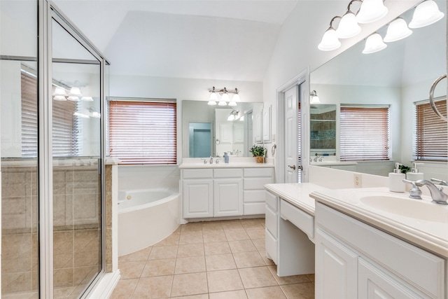3209 S Bay Breeze Ln, Fort Worth, TX 76179 - full bath featuring vaulted ceiling, a stall shower, tile patterned flooring, a garden tub, and two vanities