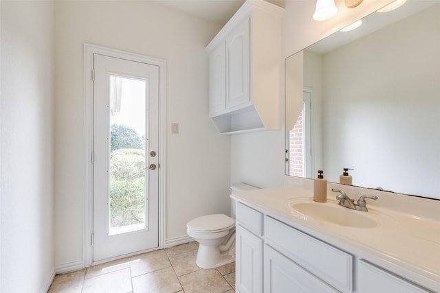 3209 S Bay Breeze Ln, Fort Worth, TX 76179 - bathroom featuring vanity, toilet, tile patterned flooring, and baseboards