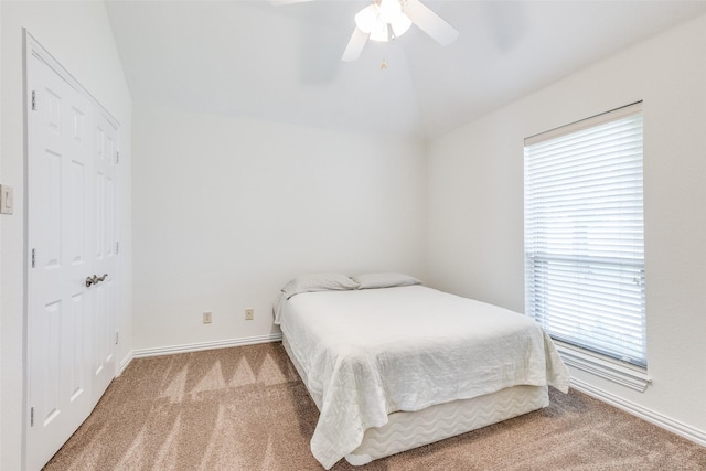 3209 S Bay Breeze Ln, Fort Worth, TX 76179 - carpeted bedroom with vaulted ceiling, baseboards, and ceiling fan