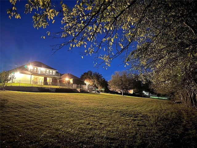 3209 S Bay Breeze Ln, Fort Worth, TX 76179 - yard at night featuring a lawn