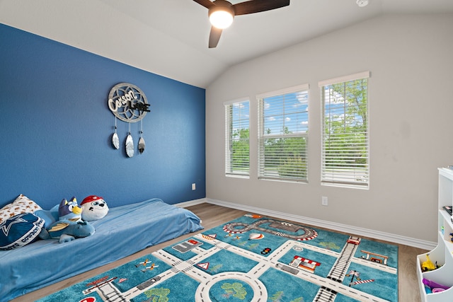 3112 Kingsgarden Rd, Denton, TX 76207 - bedroom with vaulted ceiling, baseboards, wood finished floors, and ceiling fan