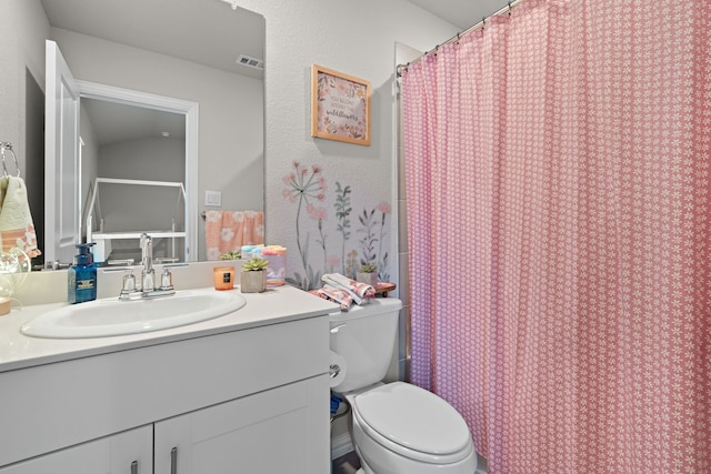 3112 Kingsgarden Rd, Denton, TX 76207 - full bath featuring toilet, vanity, and a shower with shower curtain