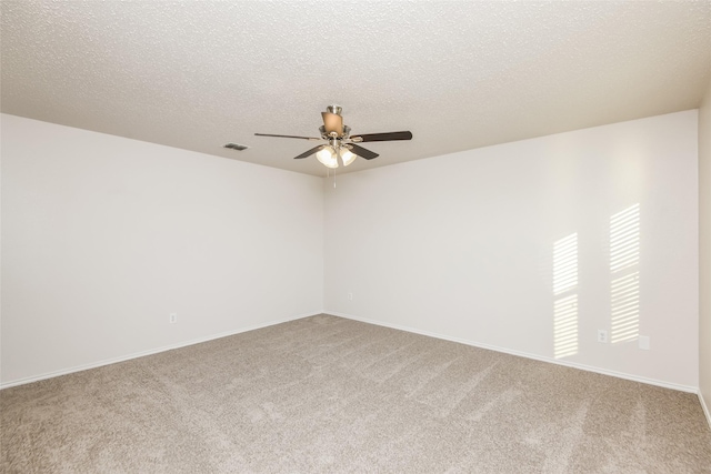 4913 Creek Ridge Trl, Fort Worth, TX 76179 - spare room with ceiling fan, carpet floors, baseboards, and a textured ceiling