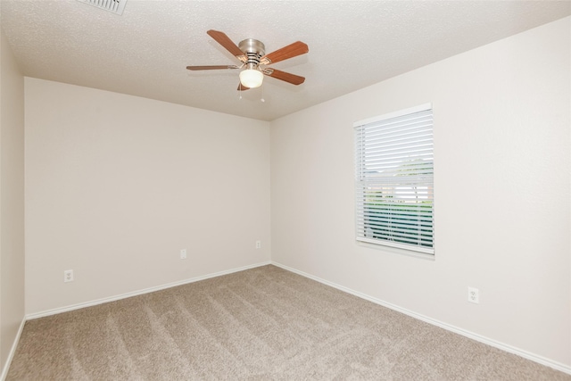 4913 Creek Ridge Trl, Fort Worth, TX 76179 - spare room featuring carpet flooring, a ceiling fan, and baseboards