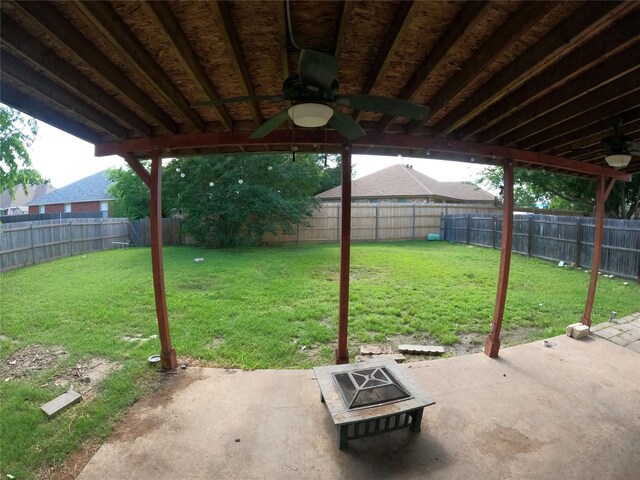 7301 Wayfarer Trl, Fort Worth, TX 76137 - view of patio featuring a ceiling fan and an outdoor fire pit