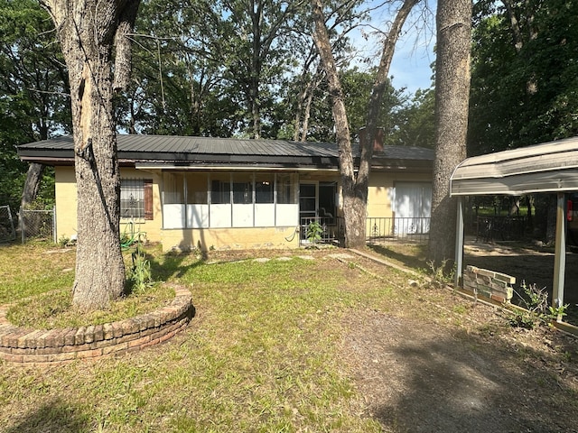 1505 Grove Dr, West Tawakoni, TX 75474 - view of front facade with concrete block siding and metal roof