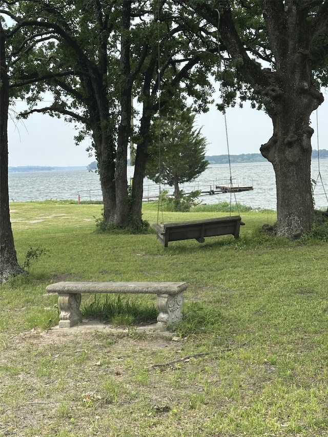 1505 Grove Dr, West Tawakoni, TX 75474 - view of home's community featuring a water view and a yard