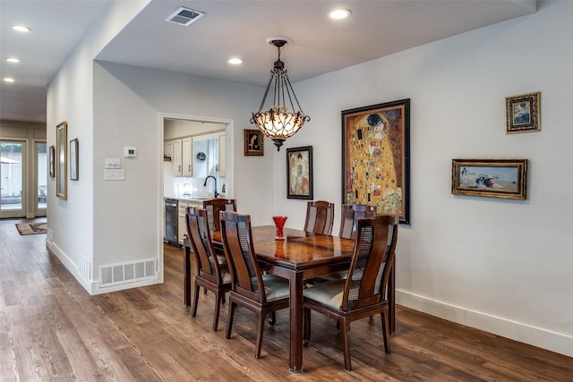 3552 Granada Ave Unit B, University Park, TX 75205 - dining room with a chandelier, recessed lighting, wood finished floors, and baseboards
