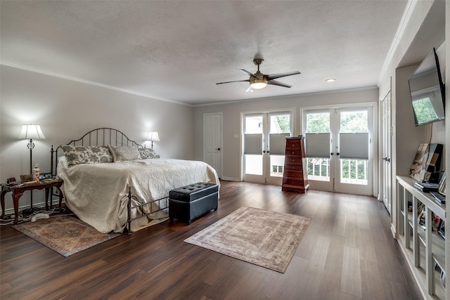 3552 Granada Ave Unit B, University Park, TX 75205 - bedroom with french doors, access to outside, crown molding, dark wood-style flooring, and a textured ceiling