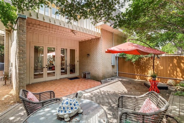 3552 Granada Ave Unit B, University Park, TX 75205 - view of patio featuring french doors, fence, and a deck
