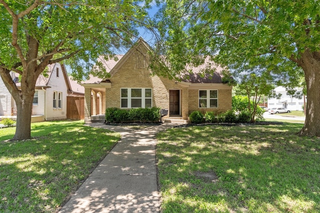 2100 Tremont Ave, Fort Worth, TX 76107 - view of front of house with brick siding and a front lawn