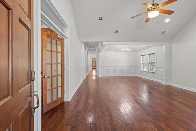 2100 Tremont Ave, Fort Worth, TX 76107 - unfurnished living room with a chandelier, dark wood-style flooring, vaulted ceiling, and ceiling fan