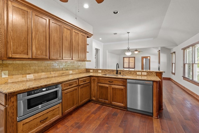 2100 Tremont Ave, Fort Worth, TX 76107 - kitchen featuring stainless steel dishwasher, ceiling fan, a sink, brown cabinets, and recessed lighting