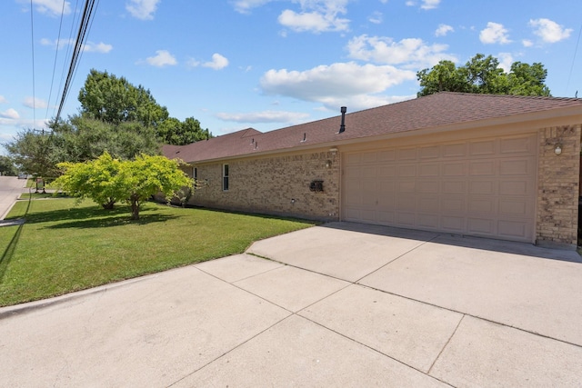 2100 Tremont Ave, Fort Worth, TX 76107 - view of front facade with brick siding, an attached garage, driveway, and a front lawn