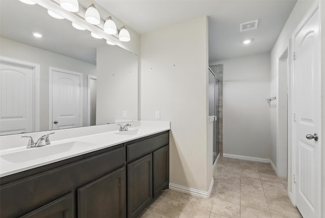 240 Springwood Ranch Loop, Springtown, TX 76082 - bathroom with double vanity, a shower stall, baseboards, and recessed lighting