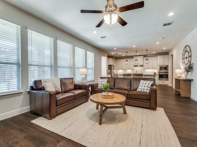 916 Timber Ridge Dr, Justin, TX 76247 - living area featuring baseboards, dark wood-style flooring, ceiling fan, and recessed lighting