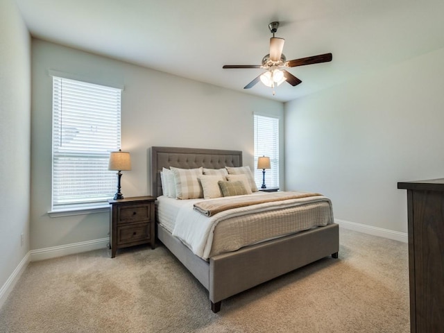 916 Timber Ridge Dr, Justin, TX 76247 - bedroom with baseboards, light colored carpet, and ceiling fan