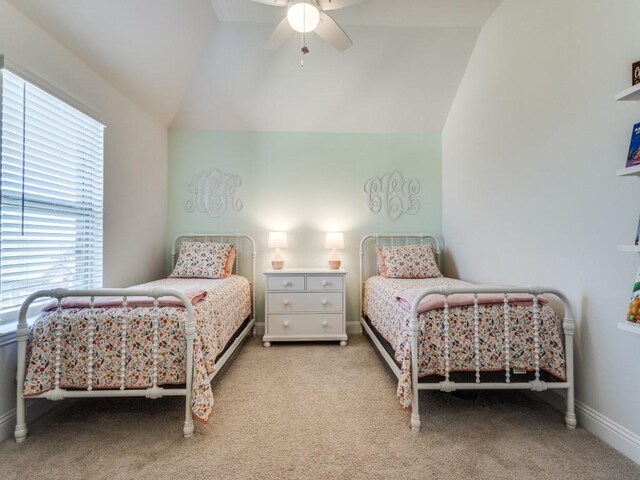 916 Timber Ridge Dr, Justin, TX 76247 - carpeted bedroom featuring vaulted ceiling, a ceiling fan, and baseboards