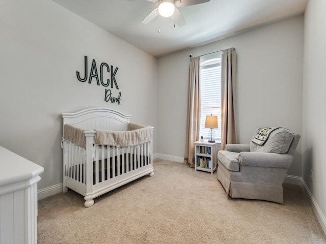 916 Timber Ridge Dr, Justin, TX 76247 - bedroom with carpet, baseboards, a crib, and a ceiling fan