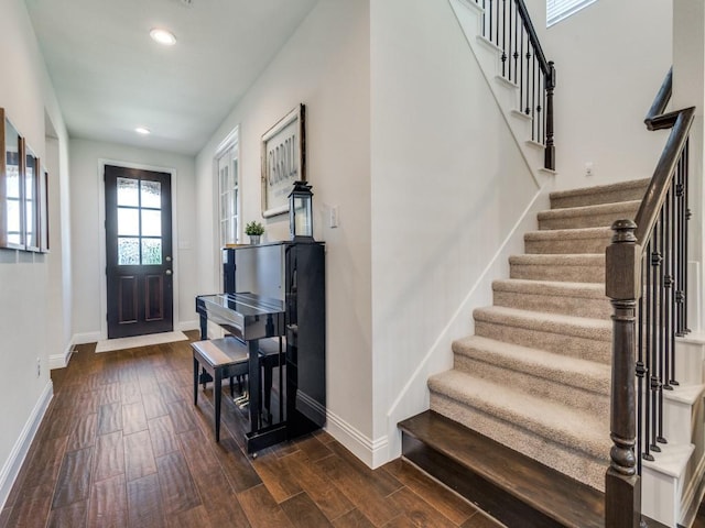 916 Timber Ridge Dr, Justin, TX 76247 - foyer entrance featuring dark wood finished floors, baseboards, stairway, and recessed lighting