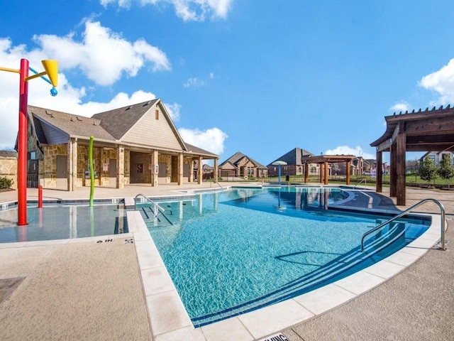 916 Timber Ridge Dr, Justin, TX 76247 - community pool with a patio area