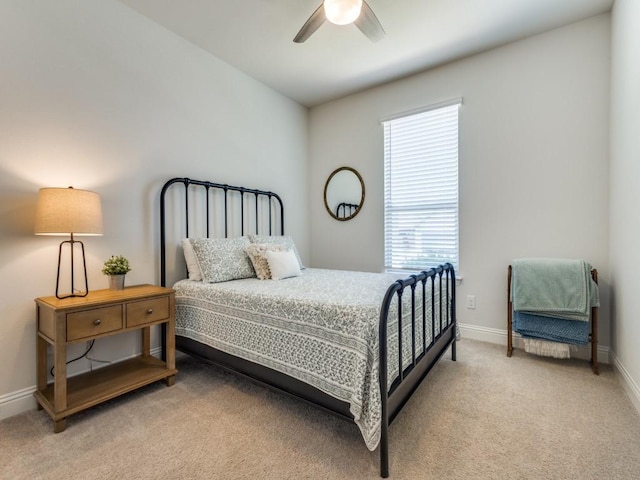 916 Timber Ridge Dr, Justin, TX 76247 - bedroom with light carpet, multiple windows, baseboards, and a ceiling fan