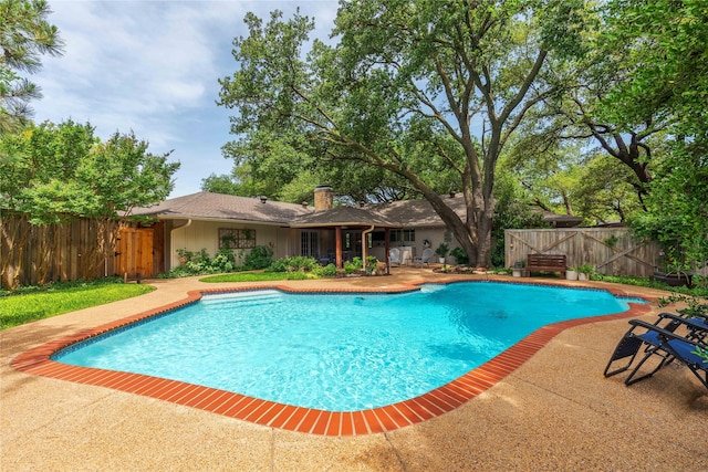3212 Woodwind Ln, Dallas, TX 75229 - view of swimming pool with a patio area and a fenced backyard