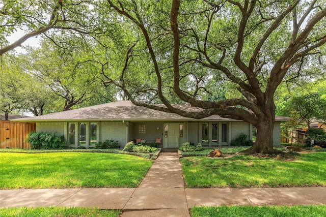 3212 Woodwind Ln, Dallas, TX 75229 - view of front facade with brick siding