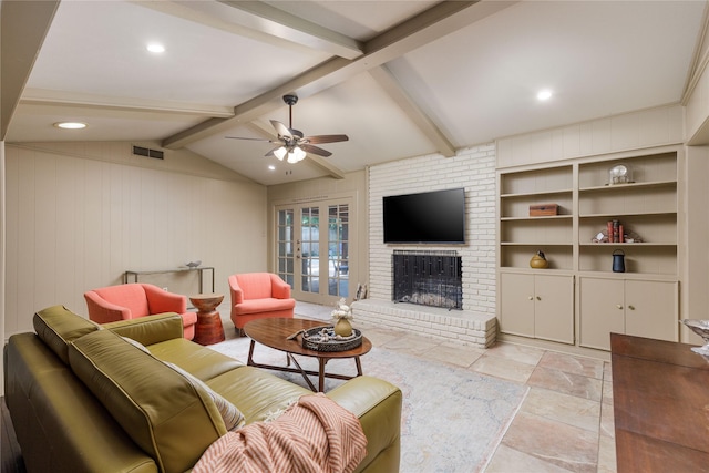 3212 Woodwind Ln, Dallas, TX 75229 - living room with a ceiling fan, a brick fireplace, built in shelves, and light stone finish flooring