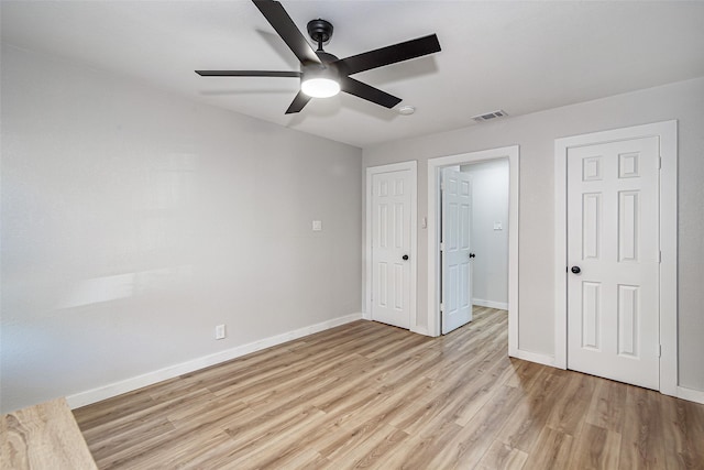 6225 Kentwood Pl, Fort Worth, TX 76112 - unfurnished bedroom with light wood-type flooring, baseboards, and a ceiling fan