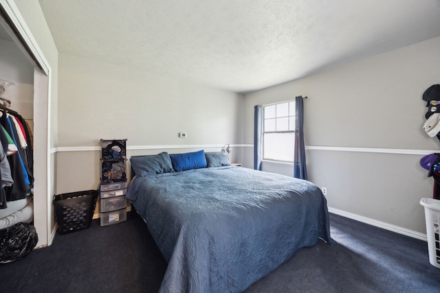 3812 Longmeadow Way, Fort Worth, TX 76133 - carpeted bedroom featuring a closet, a textured ceiling, and baseboards