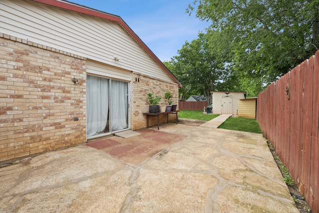 3812 Longmeadow Way, Fort Worth, TX 76133 - view of patio with a storage shed, a fenced backyard, and an outdoor structure