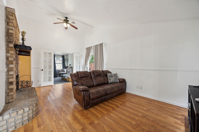 3812 Longmeadow Way, Fort Worth, TX 76133 - living room featuring ceiling fan, wood finished floors, baseboards, french doors, and high vaulted ceiling