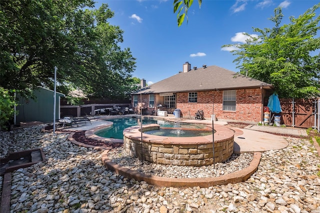1112 Bayfield Dr, Denton, TX 76209 - view of swimming pool with a fenced backyard, a patio area, and a pool with connected hot tub