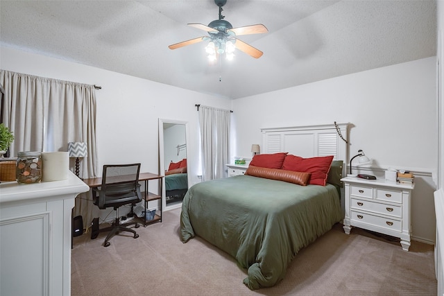 1112 Bayfield Dr, Denton, TX 76209 - bedroom featuring light carpet, an office area, a ceiling fan, and a textured ceiling