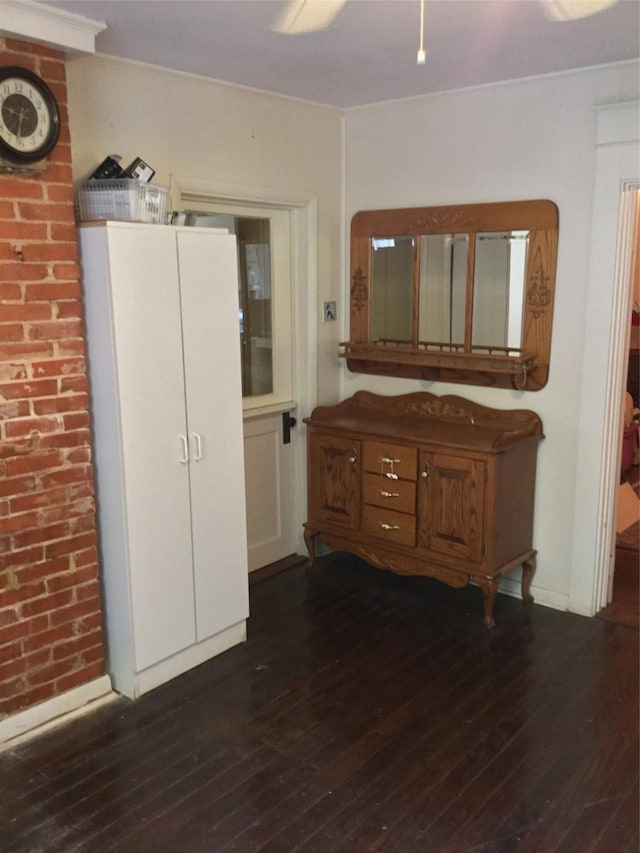 1014 N Sycamore St, Palestine, TX 75801 - interior space with dark wood-style floors and ornamental molding