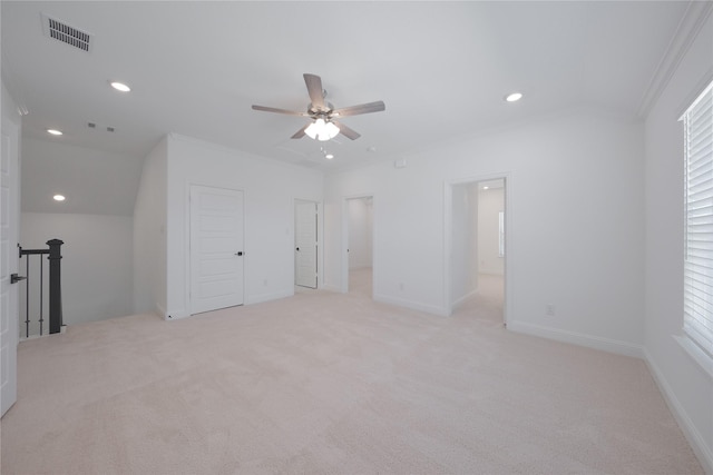 2301 Miramar Dr, Little Elm, TX 75068 - unfurnished bedroom featuring light colored carpet, recessed lighting, lofted ceiling, baseboards, and ornamental molding
