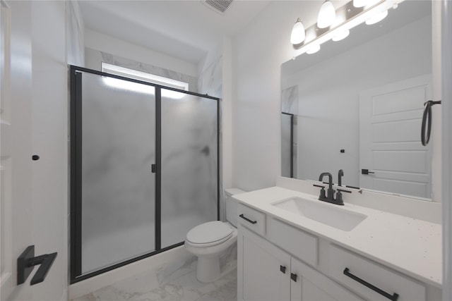2301 Miramar Dr, Little Elm, TX 75068 - bathroom with marble finish flooring, vanity, toilet, and a shower stall