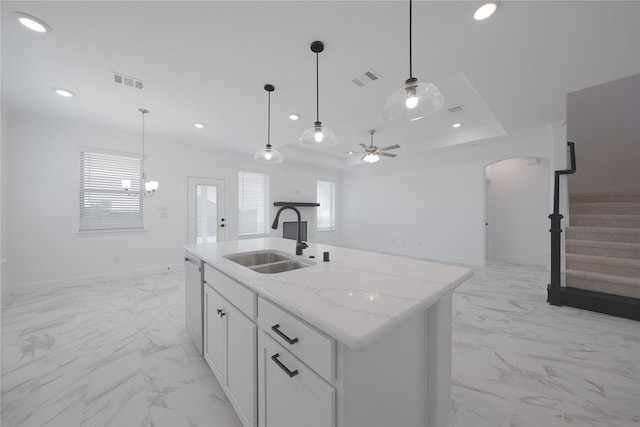 2301 Miramar Dr, Little Elm, TX 75068 - kitchen featuring a sink, light marble finish floors, arched walkways, recessed lighting, and dishwasher