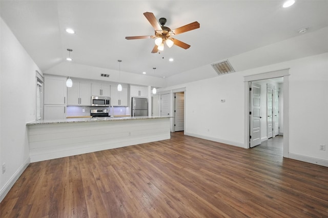 930 Baker St, Denison, TX 75020 - unfurnished living room with ceiling fan, dark wood-type flooring, baseboards, and recessed lighting