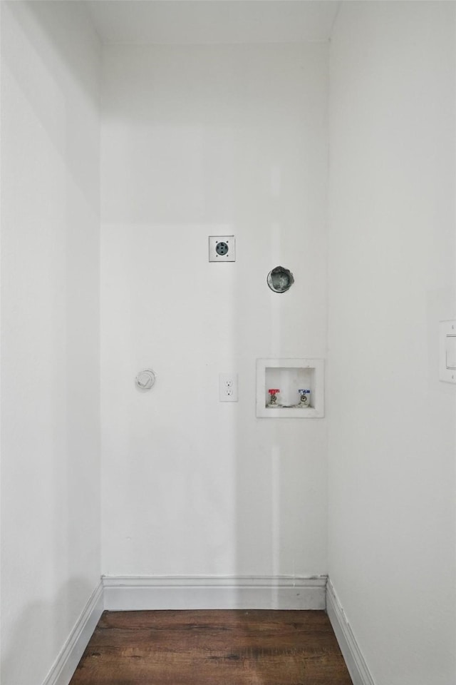 930 Baker St, Denison, TX 75020 - laundry area featuring electric dryer hookup, hookup for a washing machine, dark wood-style floors, and baseboards